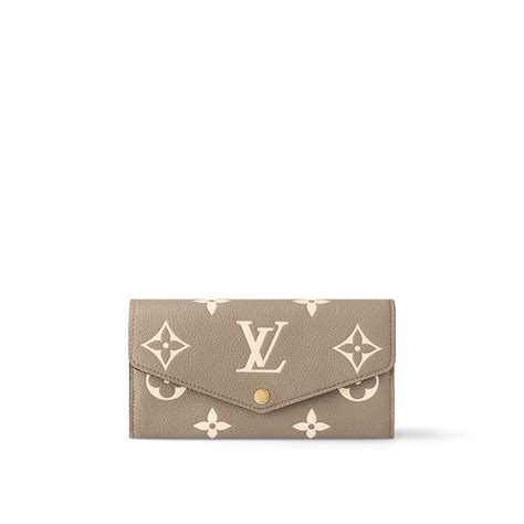 Sarah Wallet Monogram Empreinte Leather .